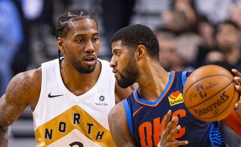 The Clippers make the signings of Leonard and George official